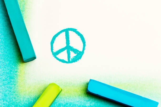 istock Bright pastel crayons draw the CND or Peace symbol 180812060