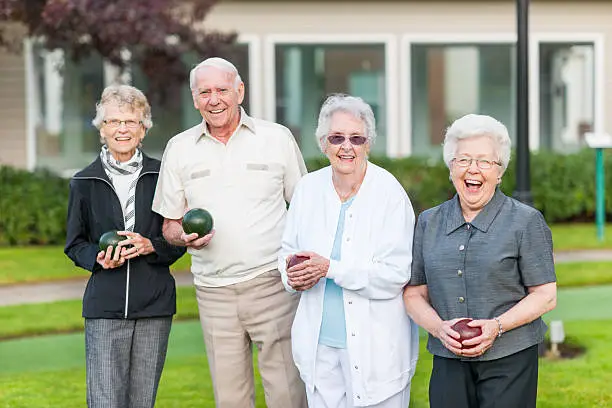 Seniors out lawn bowling