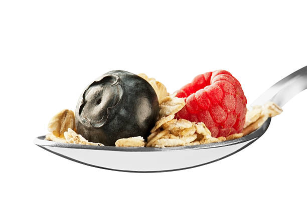 istock Spoonful of blueberry, raspberry and rolled oats 180812364