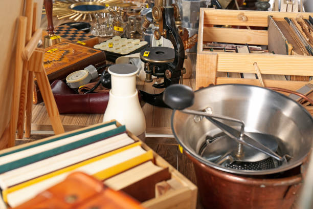 istock Many different items on wooden table. Garage sale 1808124276