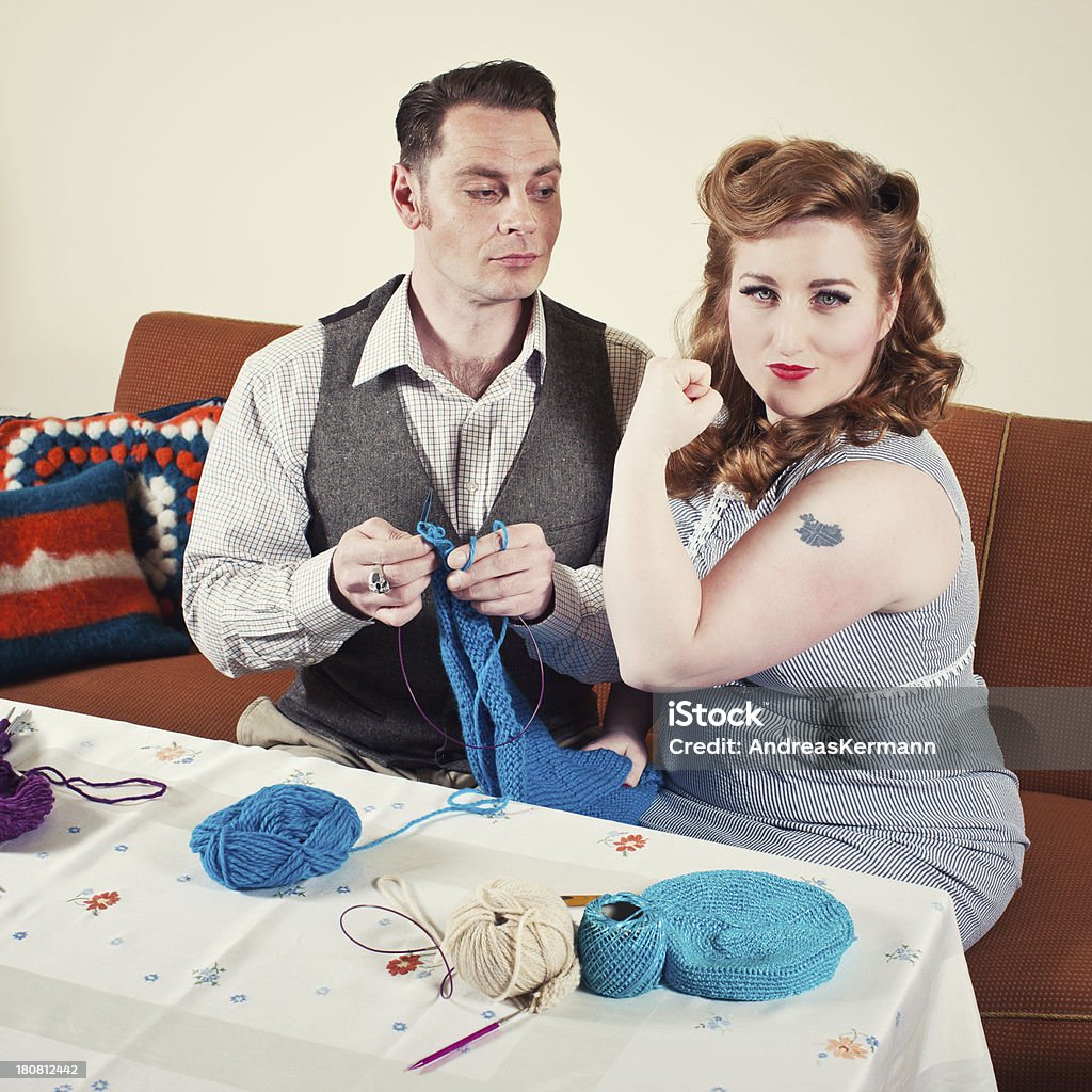 50's Couple 50's retro-style imagery - a couple sits on a sofa and knits. 30-34 Years Stock Photo