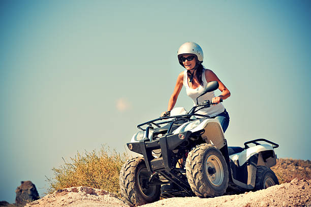 ATV's parked in the parking lot in the forest. good weather. High resolution.