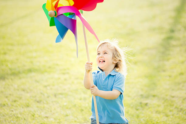 istock happy children are playing in the park 180813904