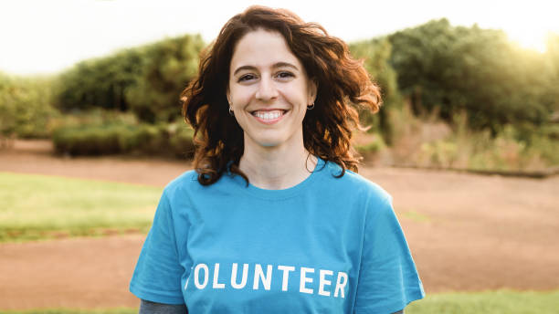 istock Young volunteer working for activist community project outdoors - Donations, environmental and charity concept 1808148085