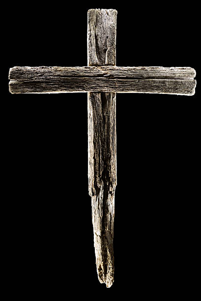 istock Wooden crucifix cross on black background 180815383