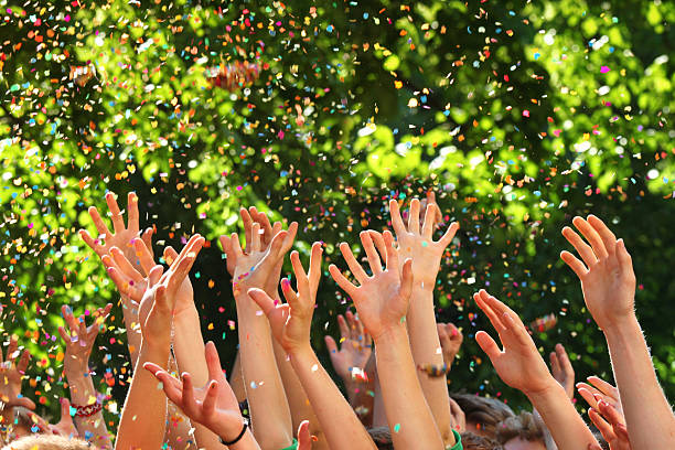 istock Happy people raising hands at concert 180816207