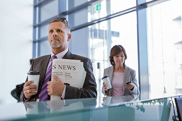 istock Senior businessman at start of work day 180816478