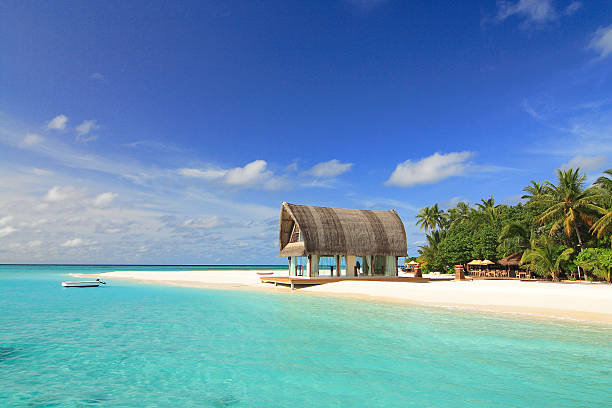 istock beautiful sandy beach near blue sea 180816934