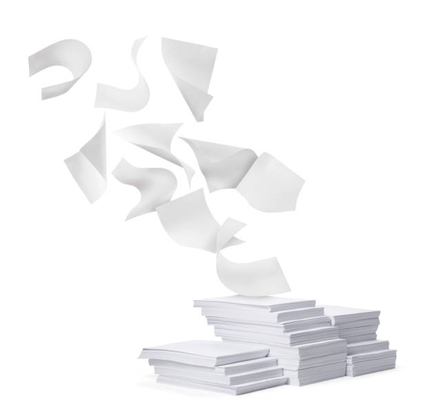 istock Sheets of paper flying over stacked ones on white background 1808169844