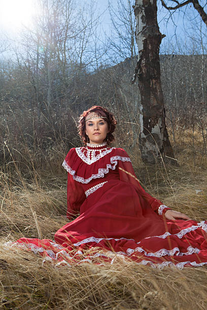 istock Young Woman Wearing Red Medieval Gown 180816990