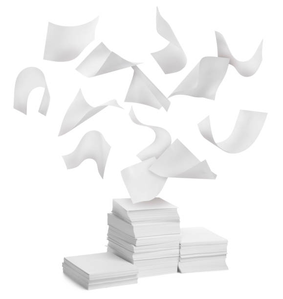 istock Sheets of paper falling onto stacked ones on white background 1808170359