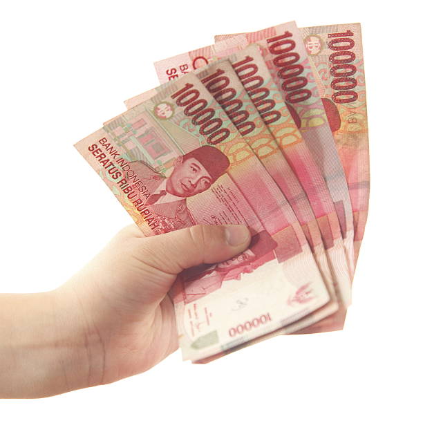 indonesische rupiah - indonesian currency stock-fotos und bilder