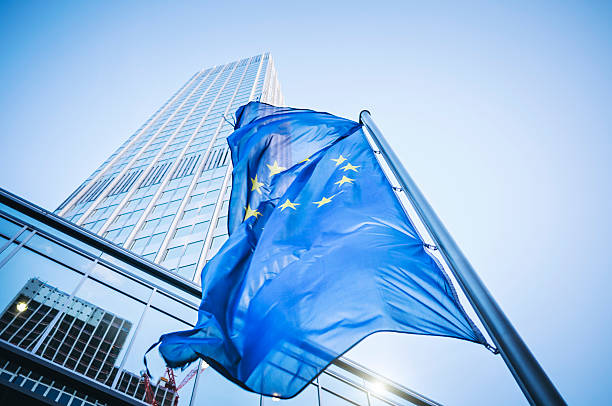 Flag of the European Community - Eurotower Flag of the European Community in front of the Eurotower in Frankfurt am Main hesse germany photos stock pictures, royalty-free photos & images