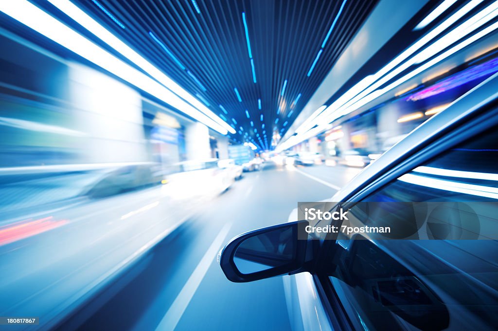 A car driving through a tunnel at night Driving in night Super Slow Motion Stock Photo
