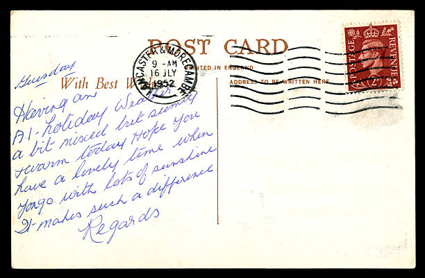 Postcard from Morecambe, England, 1952 A handwritten holiday postcard sent from Morecambe, Lancashire, in 1952. The postage stamp shows George VI, who had died in February of that year. (Isolated on black.) 1952 1952 stock pictures, royalty-free photos & images