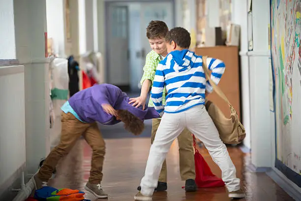 Young Boys fighting in the School corridor