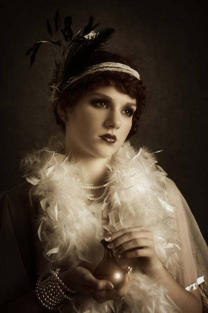 istock retro woman with perfume bottle 180819220