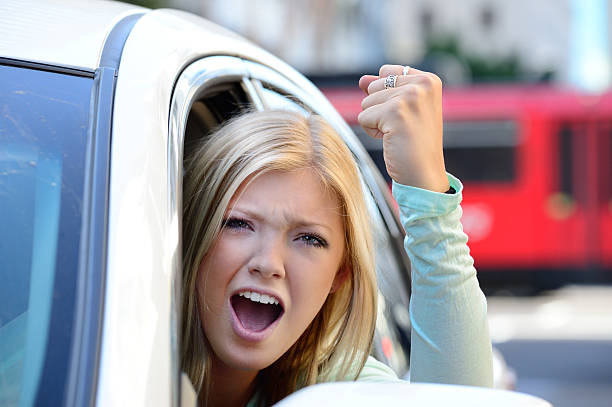 istock Angry woman in car window 180820224