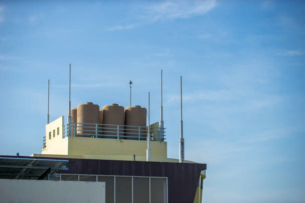istock Rooftop water tank on a clear day 1808205126
