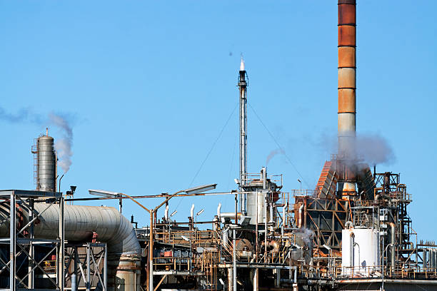 istock Old oil refinery against blue sky, copy space 180820623