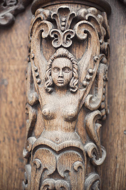 Tallinn: wooden sculpture from XVII century door Tallinn: wooden sculpture from XVII century door figurehead stock pictures, royalty-free photos & images