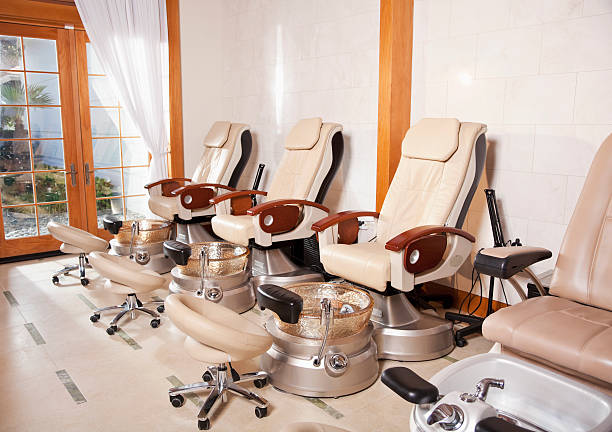 Pedicure Stations At Nail Salon Stock Photo - Download Image Now - Pedicure, Nail Salon, Chair - iStock