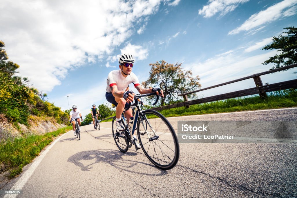Group of cyclist riding on a countryroad https://dl.dropboxusercontent.com/u/22837186/lightbox_cyclist.jpg Cycling Stock Photo