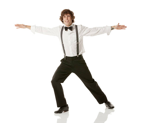 istock Man dancing with his arms outstretched 180821207