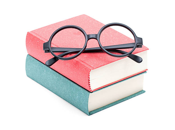 istock Books and glasses isolated on white background 180821349
