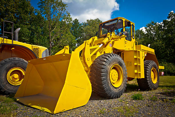 istock Yellow Bulldozer in road construction 180821617