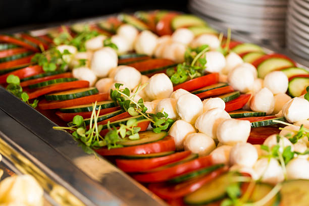 Fresh breakfast buffet with tomato slices and mozarella balls
