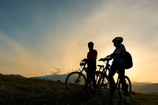 istock friends with bike 180822250