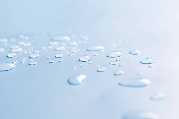 istock Drops of water on a white table top 180822883
