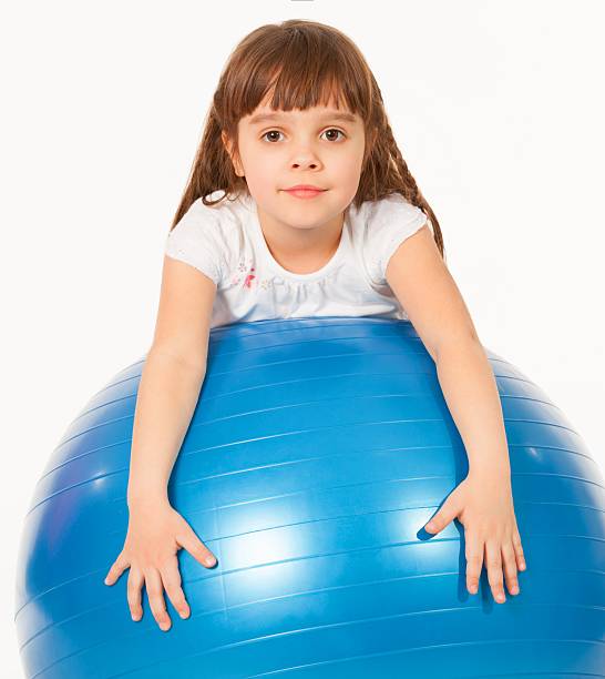 istock Child with gym ball 180823627