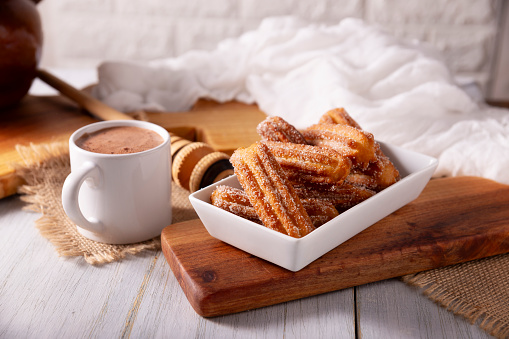 Churros. Fried wheat flour dough, a very popular sweet snack in Spain, Mexico and other countries where it is customary to eat them for breakfast or snack accompanied by hot chocolate or coffee.