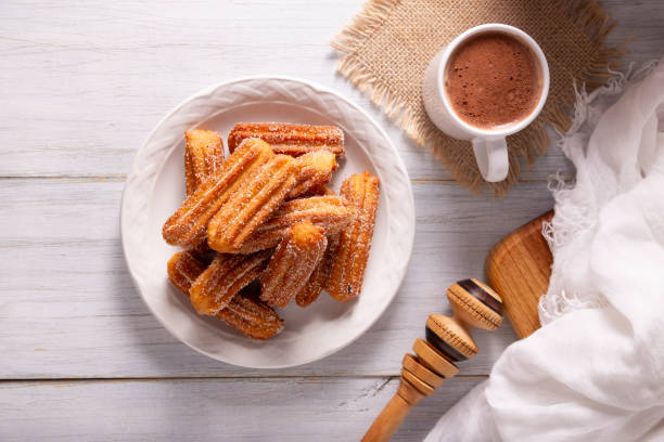 istock Churros fried dough and hot chocolate recipe topview 1808236442