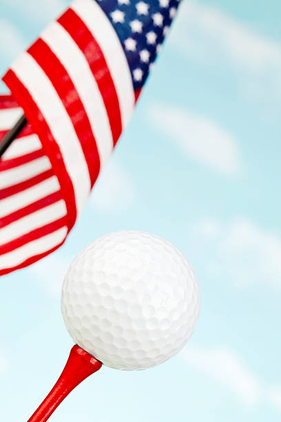 istock American Flag with White Golf Ball on Red Tee 180823730