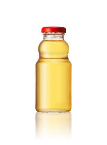 Apple Juice Bottle on white with clipping path.
