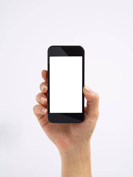 istock Hand holding smartphone up against a white background 180824200