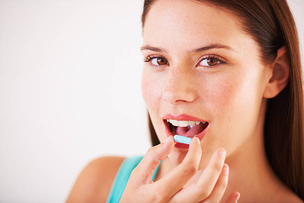 istock Starting the day with a vitamin capsule 180824218