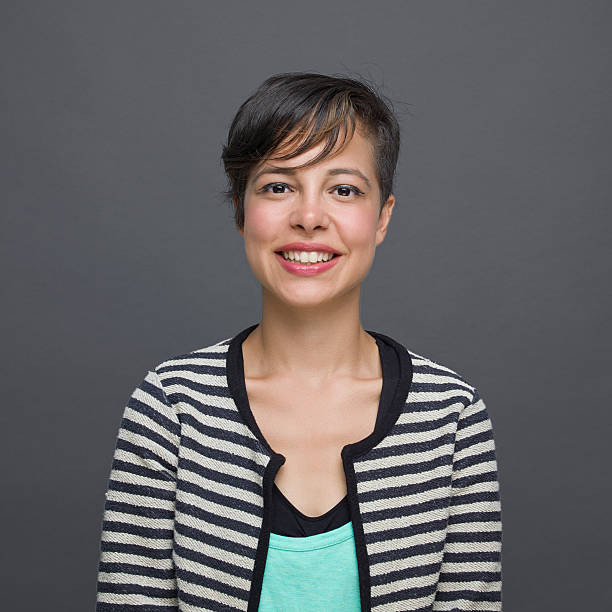 istock Young woman smiling portrait 180824248