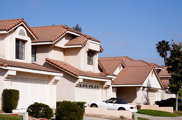 istock Stucco Home Exteriors and Blue Sky 180824814