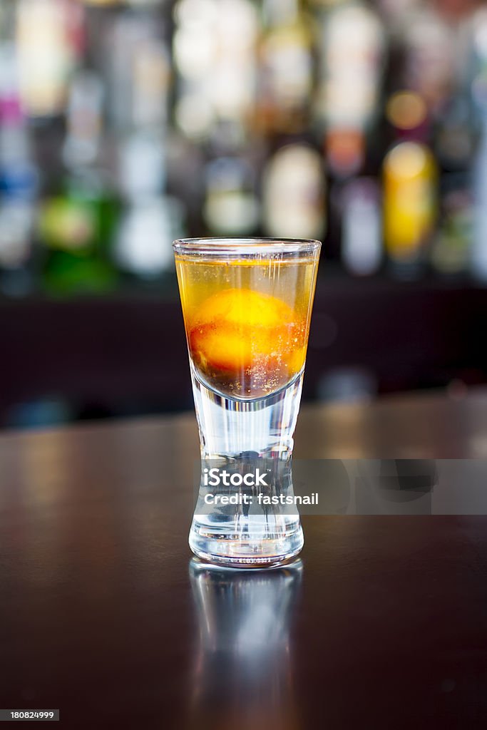 Prairie Oyster cocktail on the classic black bar table Prairie Oyster shot cocktail on the classic black bar table Oyster Stock Photo