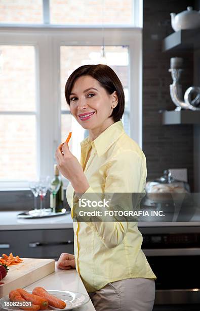 Young Woman In The Kitchen Stock Photo - Download Image Now - Adult, Adults Only, Apartment