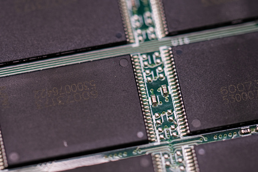Memory chips of a SATA SSD hard drive.