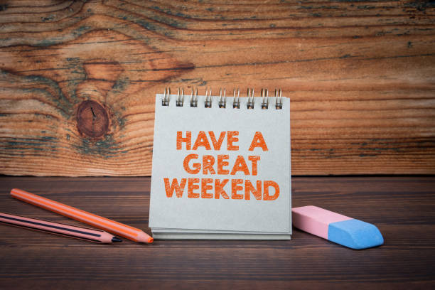 istock Have a great weekend. Cardboard notepad on wooden texture table 1808252526
