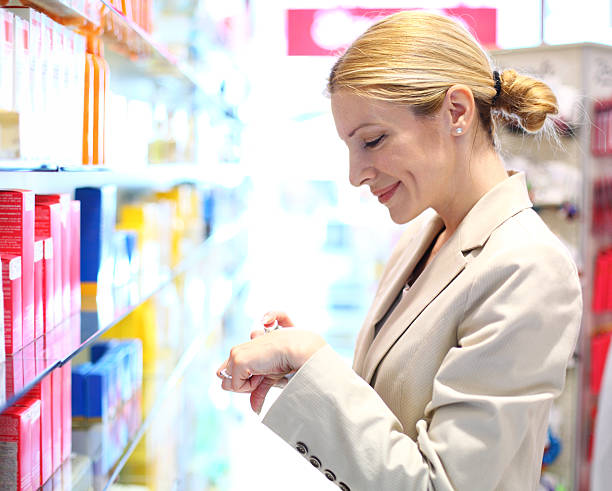 istock Woman buying cosmetics. 180825627