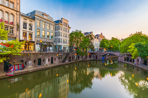 31-05-2020 Utrecht, the Netherlands - Traditional dutch houses, streets and bridges during dusk. Oudegracht canal, city centre, High Dynamic Range HDR image