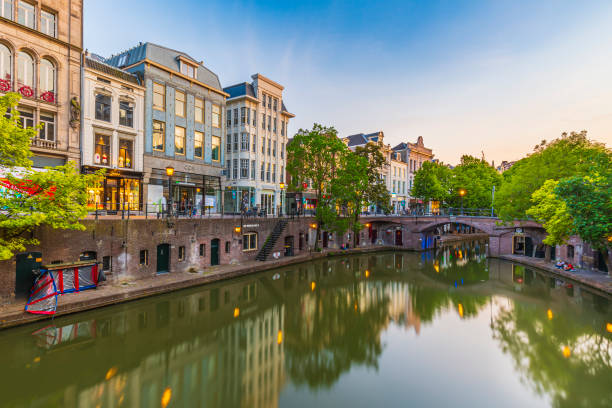 31-05-2020 Utrecht, the Netherlands - Traditional dutch houses, streets and bridges during dusk. stock photo