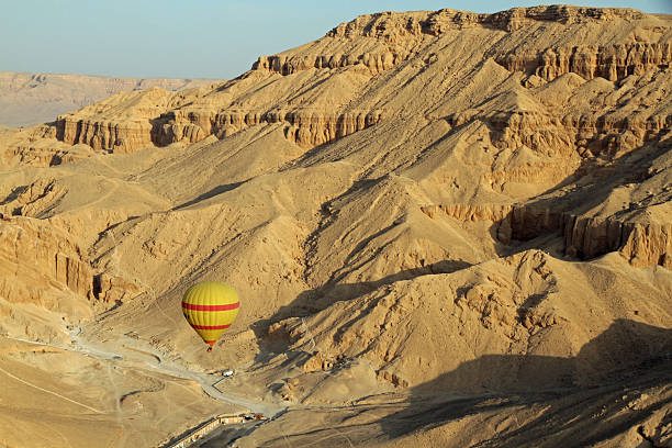 istock Hot Air Balloon over Sahara Desert 180826566